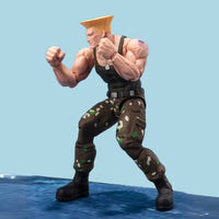 Thumbnail for Figura de acción de Guile verde de Bandai Street Fighter